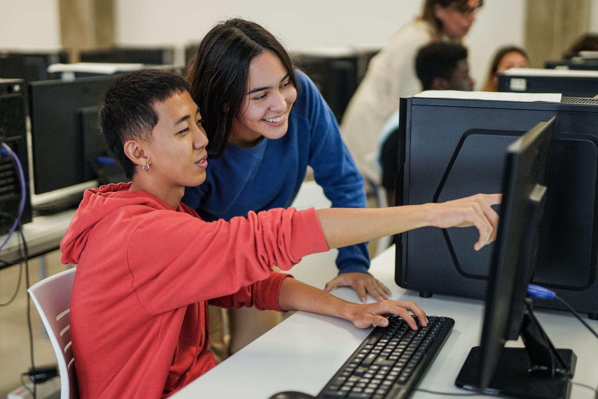 Students working together on a classroom assignment